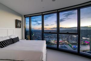 a hotel room with a view of the ocean at Brisbane Skytower in Brisbane