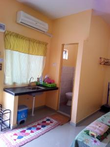 Letto o letti in una camera di Homestay Teratak Umi Klang