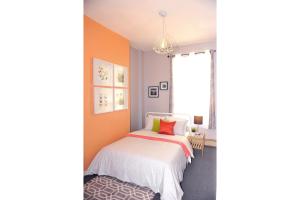 Llit o llits en una habitació de Dream Catcher Travel House