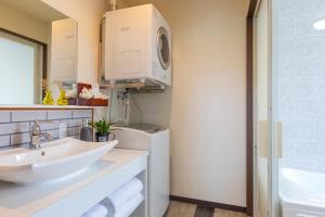 Kuchyň nebo kuchyňský kout v ubytování Good Day Hotel + 21 fotografií