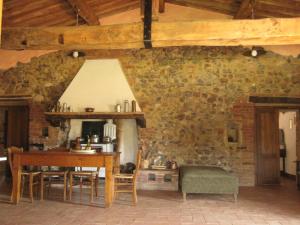 Uma área de estar em la Casa - Agriturismo with pool between Siena and Grosseto