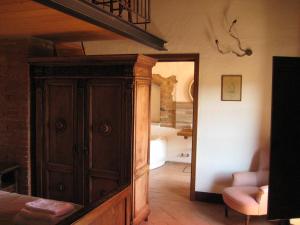 Cama ou camas em um quarto em la Casa - Agriturismo with pool between Siena and Grosseto