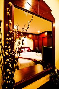 Voodi või voodid majutusasutuse Baan Sudarat Hotel toas