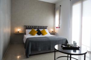 Posteľ alebo postele v izbe v ubytovaní New Gate City Break Suite