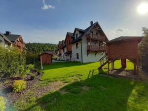 Vonkajšia záhrada v ubytovaní Szczawnica Apartament C6
