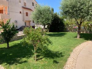 Zahrada ubytování Apartments Dumančić