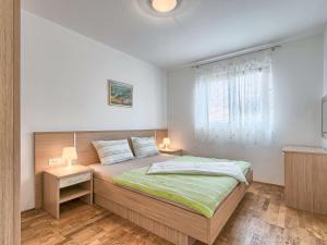 Postel nebo postele na pokoji v ubytování Apartment Villa Alpa-6 by Interhome