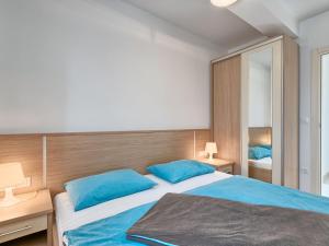 Postel nebo postele na pokoji v ubytování Apartment Villa Alpa-6 by Interhome