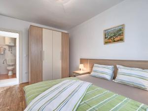 Postel nebo postele na pokoji v ubytování Apartment Villa Alpa-6 by Interhome