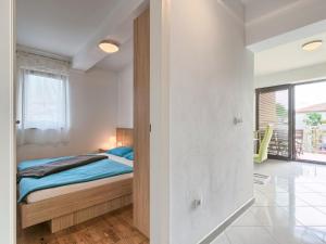 Postel nebo postele na pokoji v ubytování Apartment Villa Alpa-6 by Interhome