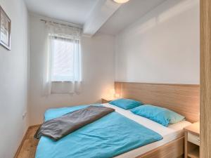 Postel nebo postele na pokoji v ubytování Apartment Villa Alpa-6 by Interhome