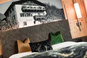 Postel nebo postele na pokoji v ubytování Hotel Brunnhofer