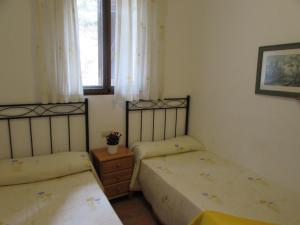 Posteľ alebo postele v izbe v ubytovaní Casa Rural La Canal De Salem + 36 fotografií