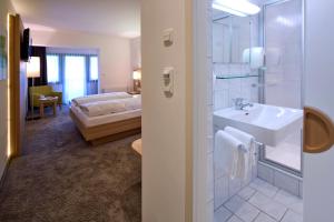 Koupelna v ubytování Geniesserhotel Alpin GmbH + 26 fotografií