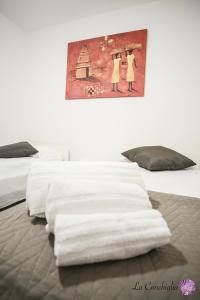 Posteľ alebo postele v izbe v ubytovaní Casa la conchiglia sulla spiaggia
