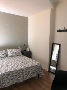 En eller flere senger på et rom på L'Iris B&B in Terrazza