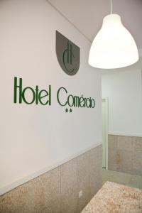 Uma cama ou camas num quarto em Hotel Comércio