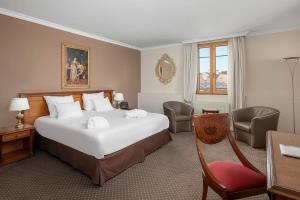 Letto o letti in una camera di Hotel Le Rive