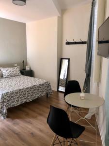 En eller flere senger på et rom på L'Iris B&B in Terrazza
