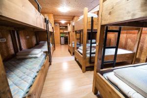 two bunk beds in a small room at Hostel Paradiso in Tolmin