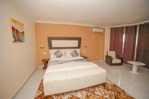 Postel nebo postele na pokoji v ubytování Fini Hotel Bobende
