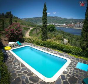 The swimming pool at or close to Villa dos Pingueis