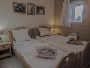 Ένα ή περισσότερα κρεβάτια σε δωμάτιο στο Le Cairn +4 φωτογραφίες