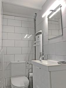 Ванная комната в L IDEAL 56 (RDC sur rue) dans Triangle d Or (plage et casino à 300m)