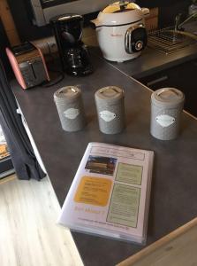 a kitchen counter with a counter top with a counter top at CHALET LE HERISSON in Saint-Laurent-du-Jura