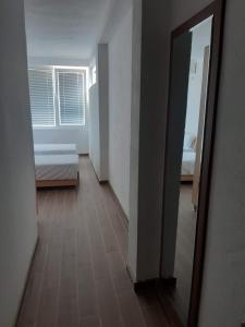 Postel nebo postele na pokoji v ubytování Vila Oska