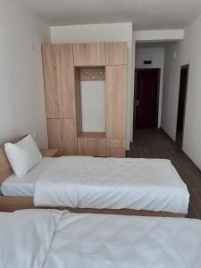 Postel nebo postele na pokoji v ubytování Vila Oska