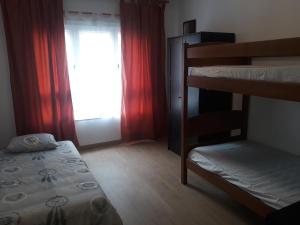 A bed or beds in a room at Apartamento barbadiel Nocedo-n 11