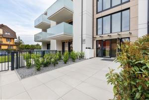 an image of a building with a walkway at Sunny Rewal Apartments by Renters in Rewal