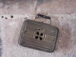 a metal box on the ground with a pipe at Chateau de Chémery in Chémery