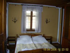 Postel nebo postele na pokoji v ubytování Family Hotel Kalina