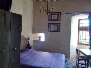 Postel nebo postele na pokoji v ubytování Chateau de Chémery