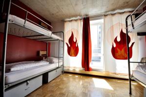 Ένα ή περισσότερα κρεβάτια σε δωμάτιο στο Five Elements Hostel and Capsules Frankfurt