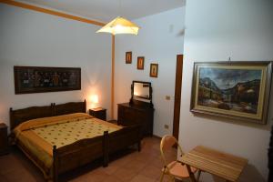 Letto o letti in una camera di B&B ABACO