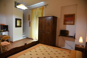 Letto o letti in una camera di B&B ABACO