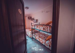 La Casa Sul Fiordo Lago del Turano客房内的一张或多张床位