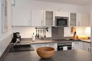 Kuchyň nebo kuchyňský kout v ubytování Ferienwohnung Badestrand