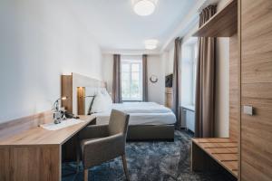 Postel nebo postele na pokoji v ubytování Hotel Restaurant Roemer