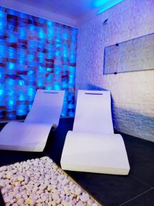 Postel nebo postele na pokoji v ubytování Hotel Belsito