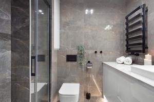 Kúpeľňa v ubytovaní Elite Apartments Garden Gates Premium + 22 fotografií