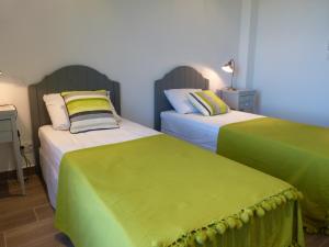 Кровать или кровати в номере Vista di Sognu