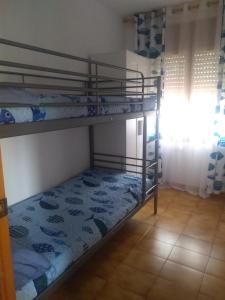 Postel nebo postele na pokoji v ubytování Villa Ingrid Costa Brava