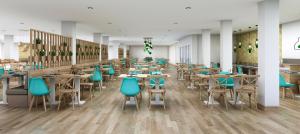 Ein Restaurant oder anderes Speiselokal in der Unterkunft Gara Suites Golf & Spa 