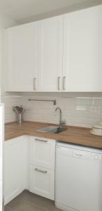 A kitchen or kitchenette at Ático Aretusa