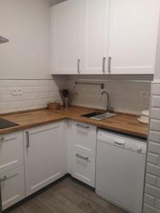 A kitchen or kitchenette at Ático Aretusa