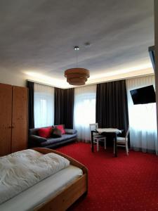 Postel nebo postele na pokoji v ubytování Bed & Breakfast Goldener Stiefel